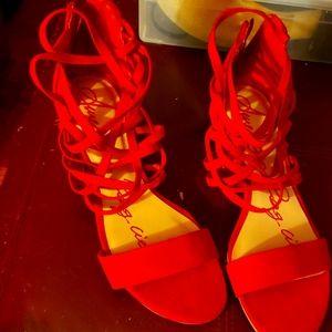 Great red seude strappy saddles never been wore